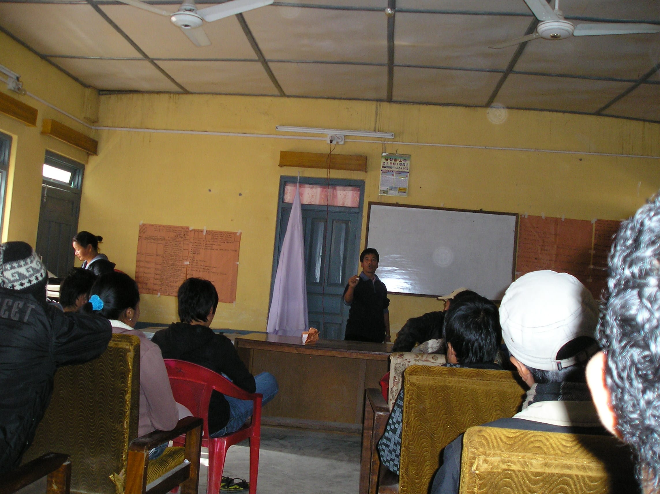 Chitra presenting information to trekking guides